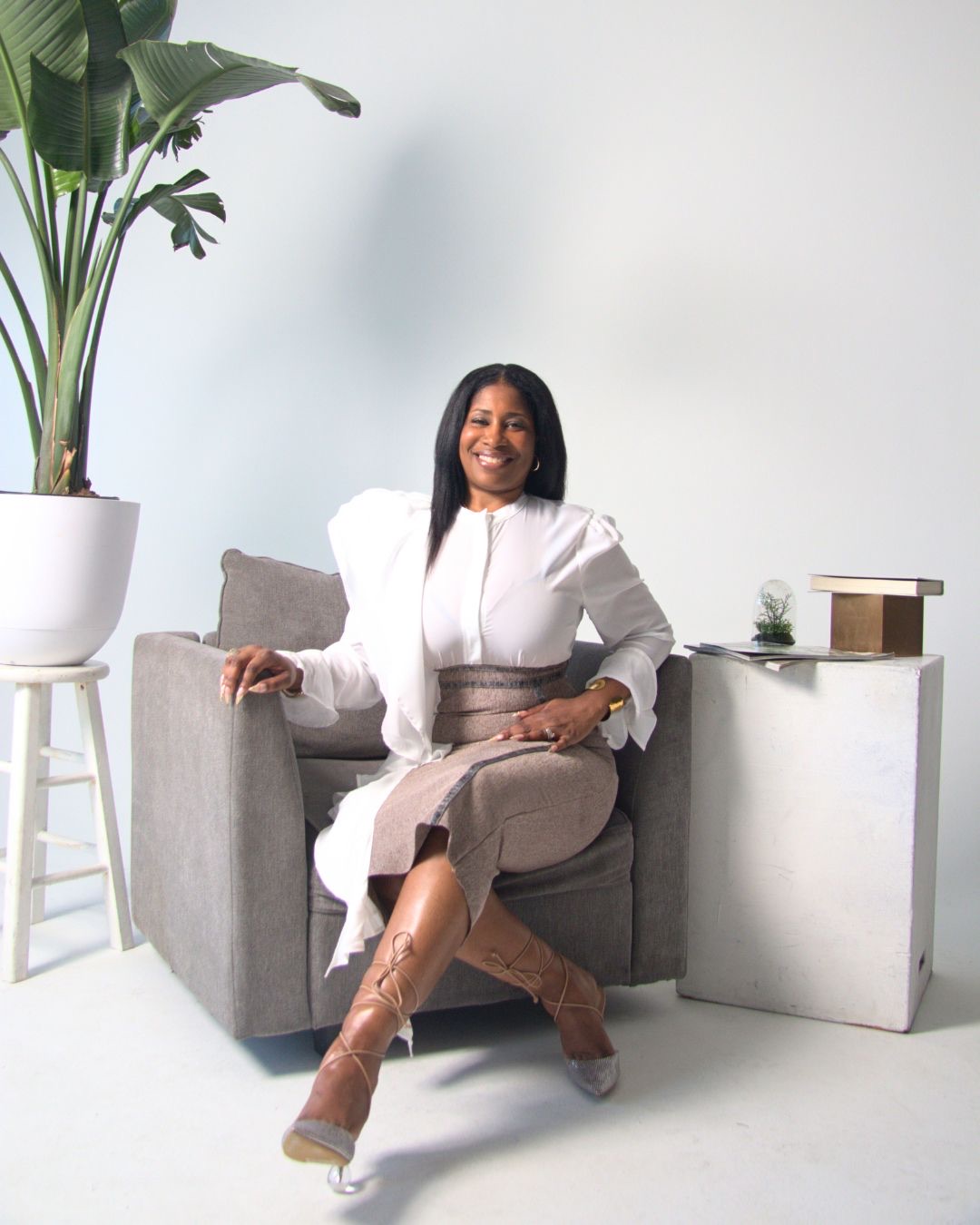 Michelle Edwards seated in a studio setting.